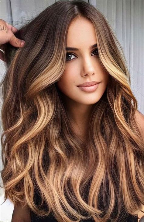 dark brown hair blonde highlights|brunette hair with blonde streaks.